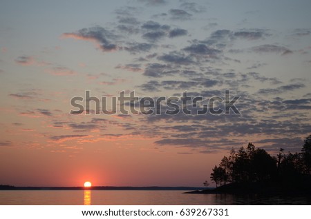 Photo of a landscape of unspoilt nature, rest, travel, image of a zizni, clean zozduh, clear water, Karelia, Finland, north, sandy beach, stones, sand, Kalevala, Solovki Islands, Russia, sun