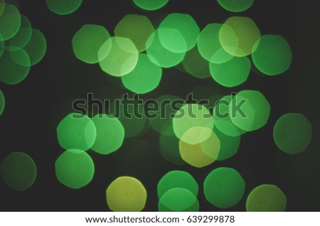 Green bokeh on a black background