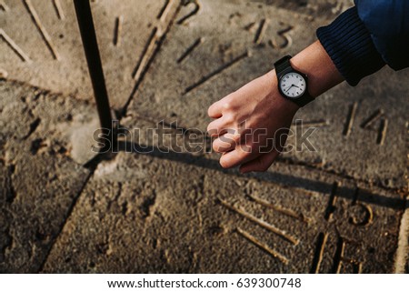 Watch and sun-clock Royalty-Free Stock Photo #639300748