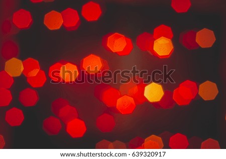 Red bokeh on a black background