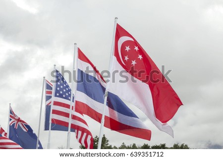 flag on blue sky and clouds