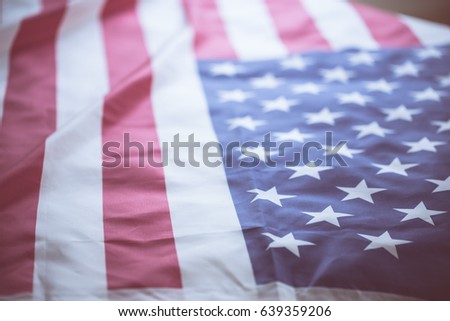 crumpled of United states of America flag; vintage color effected