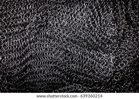 Chainmail or chain mail and Hauberk background for a medieval or middle ages theme Royalty-Free Stock Photo #639360214