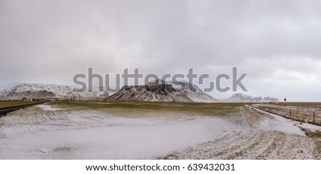 panorama picture of mountain with ice and snow. it is could weather around that area