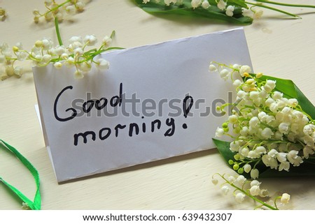 The inscription Good morning and lilies of the valley