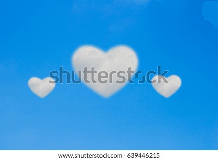 blue sky with Heart shaped cloud