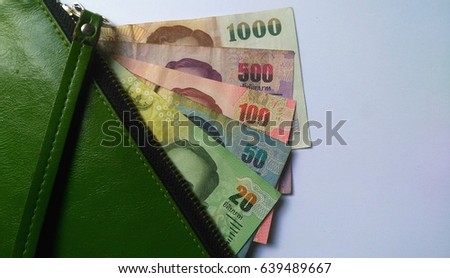 Green Wallet with Thai Bank Notes