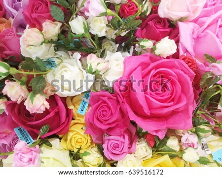 Close up of colorful roses artificial flower bouquet for sale