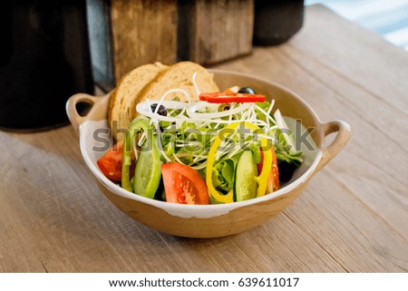 vegetable salad on wooden table