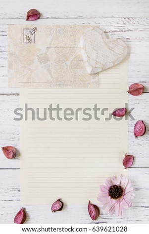 Flat lay stock photography purple flower petals letter envelope paper wood heart craft