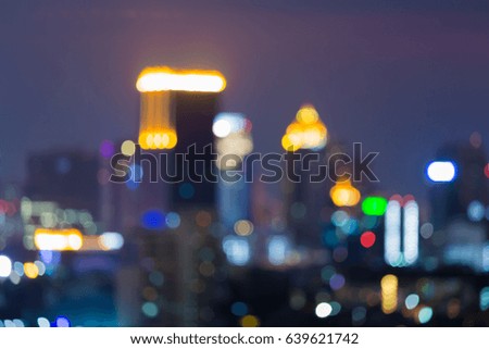 Abstract blurred bokeh light office building night view, abstract background
