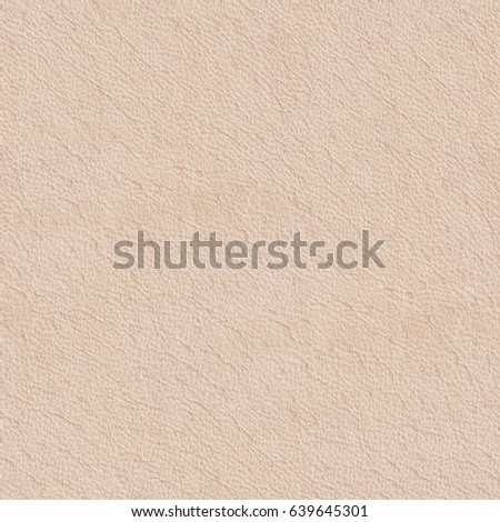 Luxury beige leather texture. Seamless square background, tile ready. High resolution photo.