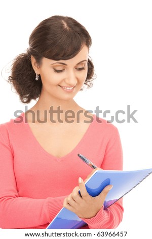 picture of a young attractive businesswoman with notebook