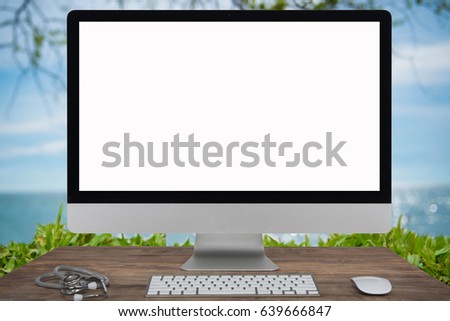 Computer Keyboard and mouse with summer white sand beach with sparkling sea water