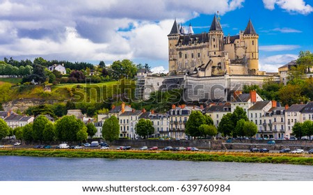 Great medieval castles of Loire valley - beautiful Saumur. France Royalty-Free Stock Photo #639760984