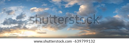 Summer sunset sky panorama with fleece clouds. Summer evening good weather background. Five shots high-resolution stitch image.