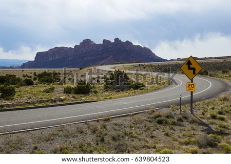 S Curve highway entrance with mountain in Utah