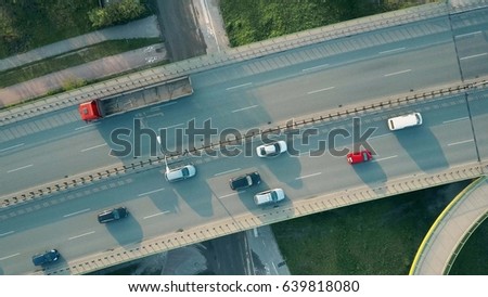 Aerial shot of a highway in the evening, top down view