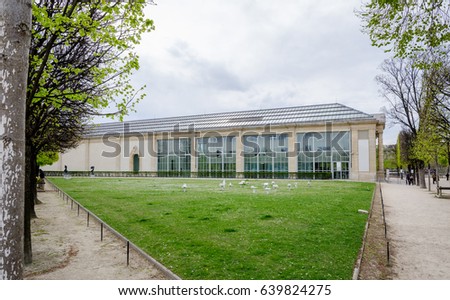 The Musee de l'Orangerie (Oragnery Museum) in the Tuileries Gardens in Paris, France, on a cloudy day Royalty-Free Stock Photo #639824275