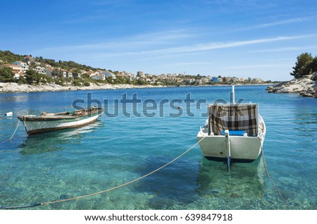 Fishing Boat in Razanj Croatia Europe. Beautiful nature and landscape photo. Nice warm sunny spring day at Adriatic Sea. Nice ocean and blue sky. Lovely outdoors in Dalmatia.