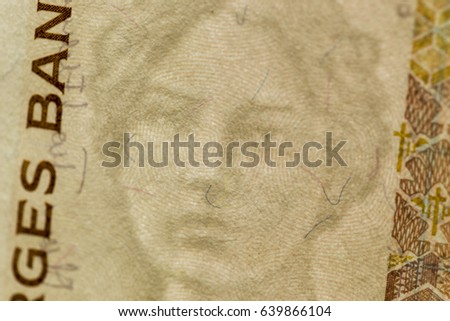 Macro detail of the watermark of the Norwegian 500 kroner banknote. The 500 bill (1999) portrays Sigrid Undset, author and winner of the Nobel Prize in literature in 1927.