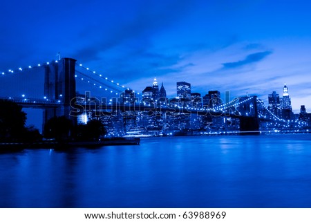 Brooklyn Bridge and Manhattan, New York. Blue tint