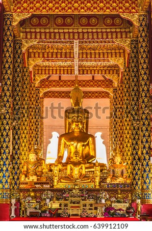 gold Buddha statue in church of wat Suan dok temple ,Chiang Mai, Thailand