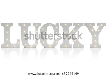 Decorative letters with illuminated embedded LED lights spelling the word LUCKY over a gradient pink and white background