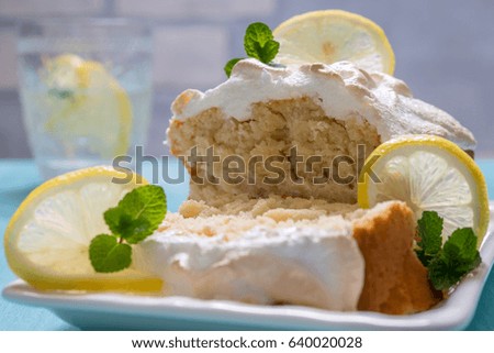 Lemon Loaf with meringue topped andcitrus slices
