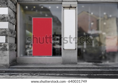 Shop window with sale banners