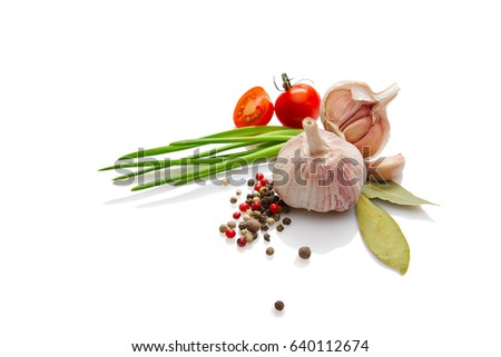 Spicy mediterranean cuisine & healthy diet: Fresh Italian herbs vegetables spices. Top view Closeup Isolated on white.Tomatoes onions pepper garlic rosemary  Royalty-Free Stock Photo #640112674