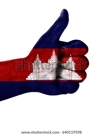 Hand making thumbs up sign.Cambodia painted with flag as symbol of thumbs like,up,okay. Isolated on white background.