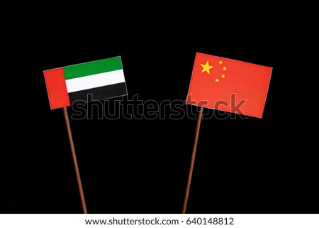 United Arab Emirates flag with Chinese flag isolated on black background