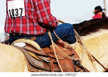 A cowboy waits to compete in the roping competition.