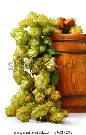 A barrel of beer with hop cones isolated