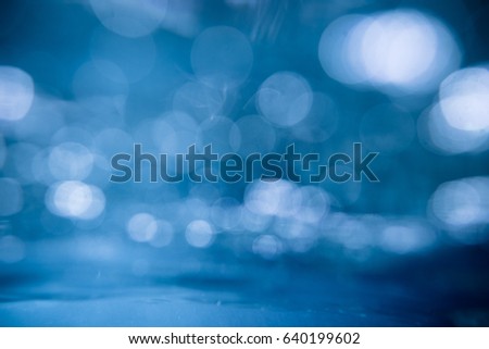 Blurred Sea water of waves and sun reflection textured,abstract background.Horizontal view