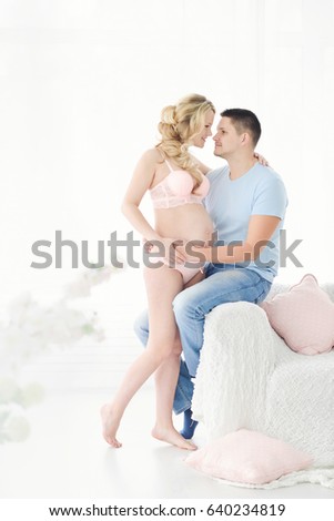 pregnant woman and her husband. Waiting for baby