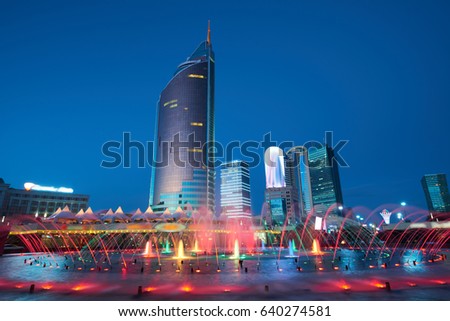 Astana cityscape. Colorful fountains. Astana is the capital of Kazakhstan