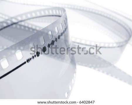 35 mm film audio track isolated in white background. Shallow depth of field. Macro shot