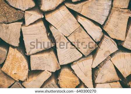 Fire wood natural background texture, chopped firewood close-up image