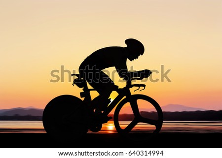 Cycling at the beach twilight time summer season