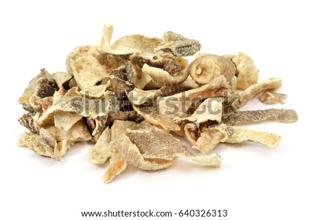 closeup of a pile of crispy fried codfish skin served as snacks on a white background