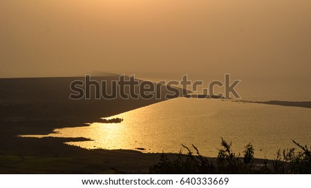 Sunset at Morbe Dam, Karjat, Maharashtra Royalty-Free Stock Photo #640333669