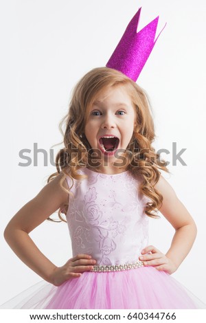 Little princess girl in pink crown and beautiful dress on white background Royalty-Free Stock Photo #640344766
