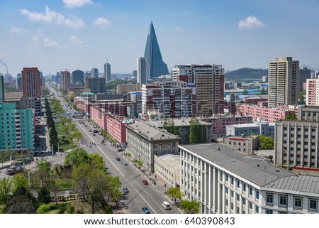 Pyongyang city scape, skyline of Pyongyang in North Korea, capital of DPRK (Democratic people's republic of Korea), road, cars and skyscrapers Royalty-Free Stock Photo #640390843