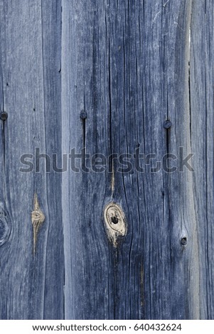 Texture of old wooden boards. Faded wood of natural color. Background for an abstract web banner and for photographing objects