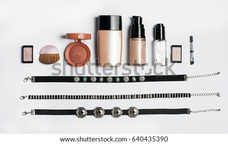 Fashion set: Beauty, decorative cosmetics. Makeup brushes set and color eyeshadow palette on white background, flat lay, top view, cutout.