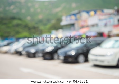 Abstract blur outdoor car parking lot in travel place bokeh background