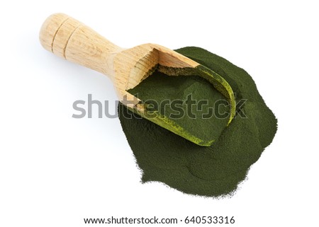 Chlorella algae powder with wooden scoop isolated on white background. Top view Royalty-Free Stock Photo #640533316