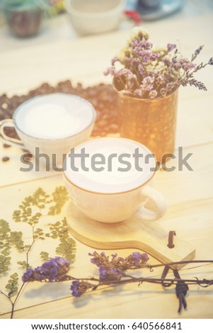 blue latte art coffee and tea, vintage filter image